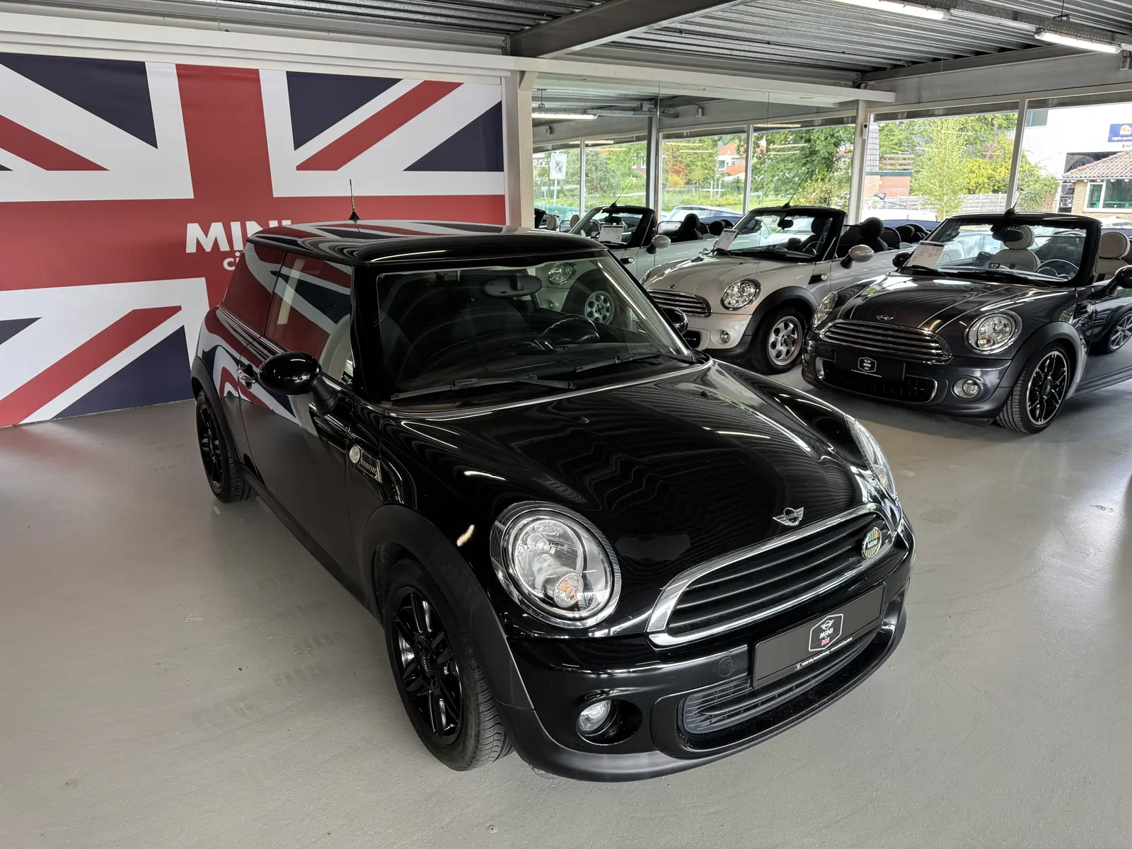 MINI One 2013 in zwart, driekwart voor