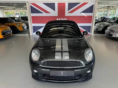 MINI Cooper S Roadster 2012 in grijs met zilveren strepen, voorzijde met kap dicht, kenteken 55-TKJ-3